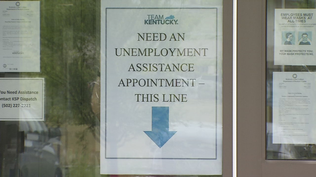 Signs directing people inside for unemployment claims